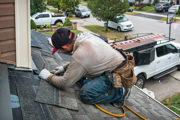 Professional Emergency Roof Repair technician working in Melrose Park, NY